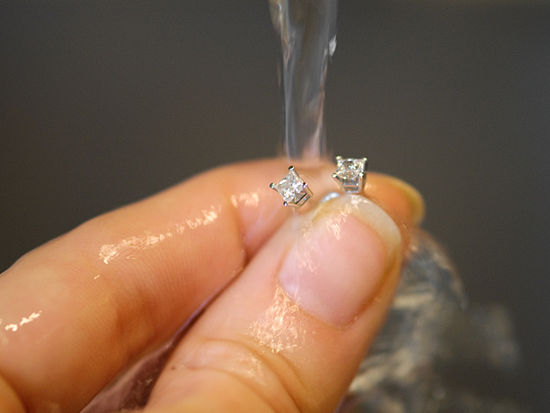 What is the right way to clean diamond earrings?
